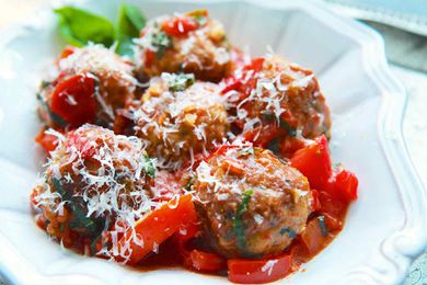 Turkey Meatballs with Tomatoes and Basil in a white bowl