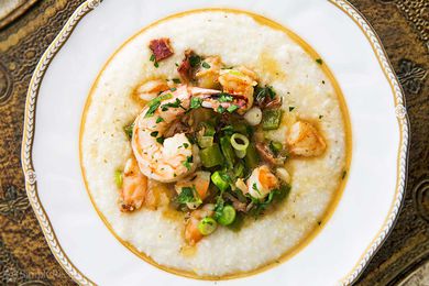 Shrimp and grits on a white plate