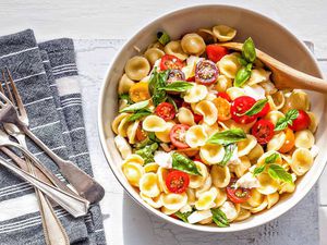 How to Make Caprese Pasta Salad - bowl of caprese salad with pasta