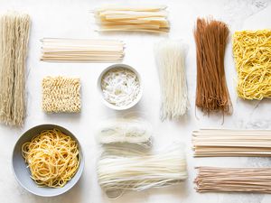 Variety of Asian Noodles on a Counter (Some Dried, Some Cooked) for A Guide to Asian Noodles