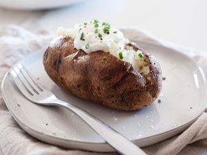 Air Fryer Baked Potatoes Topped with Sour Cream