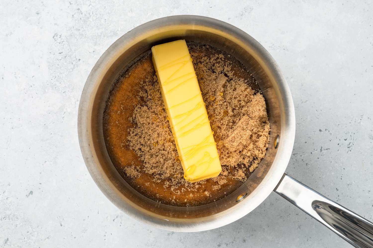 Brown Sugar, Golden Syrup, and Butter in a Sauce Pan for Flapjack Recipes
