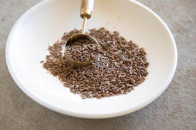 Caraway seeds in a white dish