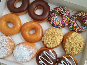 overhead view of box of a dozen donuts