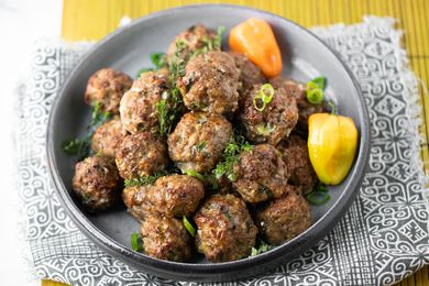 Plate of Jerk Turkey Meatballs with Two Habanero Peppers