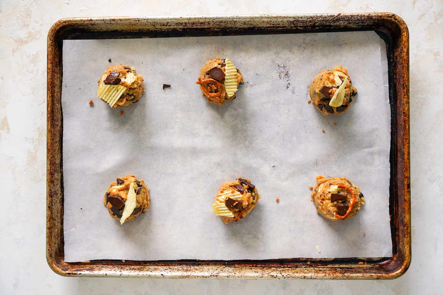 Six Portions Placed on a Parchment Paper Lined Baking Sheet