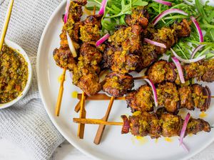 Plate of Lamb Skewers with Epis Served with Arugula