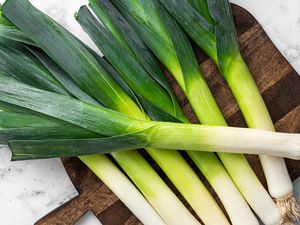 Leeks on a Cutting Board on a Counter