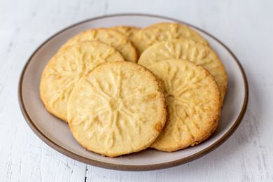 Overhead view of a plate of almond shortbread cookies