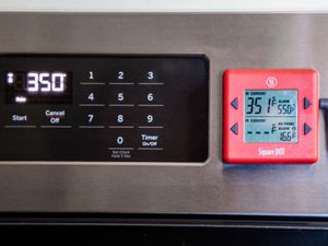 External Digital Probe Magnetically Attached to the Outside of an Oven Right Next to the Oven Control Panel (Both Read Different Temperature: Probe Reads 351F and the Oven Reads 350F)