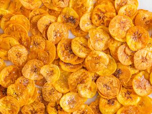 Plantain Chips Topped With Salt on the Counter