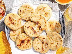 Plate of Pupusas with One Cut in Half