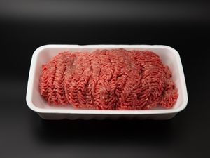 Raw ground beef open in a styrofoam tray