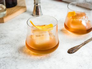 Rum Old Fashioned garnished with an orange peel