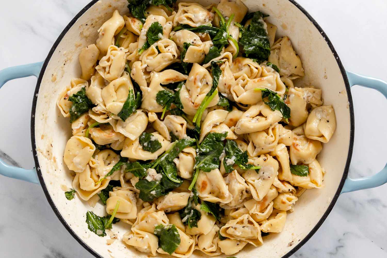 Skillet Cacio e Pepe Tortellini With Wilted Greens in a Pot 