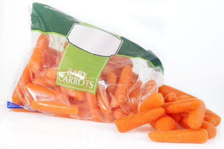 An open bag of baby carrots