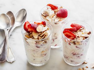Glasses of Strawberry Eton Mess with Spoons