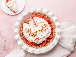 Strawberry Pretzel Pie in Pie Dish with a Slice on a Plate