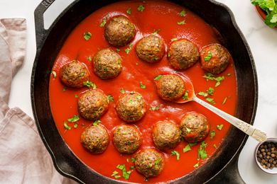 Vegan Meatballs in a Cast Iron Skillet with Tomato Sauce 