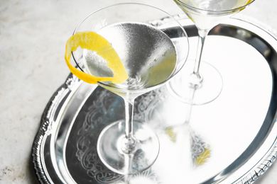 Two Glasses of Vesper Cocktail on a Silver Tray