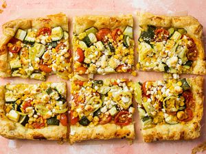 Roasted Corn, Tomato, and Zucchini Tart Cut into Slices